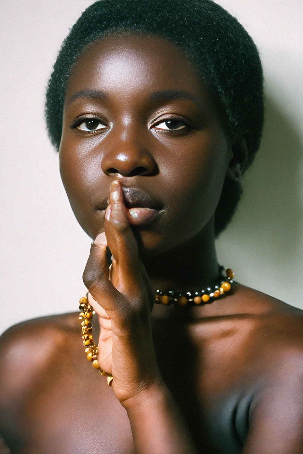 woman holding prayer beads or a sacred object, engrossed in a prayer or a meditative state, capturing the devotion and connection to higher realms