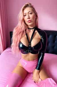 woman in a pink pvc latex bikini sitting on a bed, heaven pink, hot pink, pink body harness, pink body, pink and black, hot pink and black, olivia kemp, pink background, pink, skye meaker, ellie victoria gale, 🤬 🤮 💕 🎀, casey cooke, posing in a bedroom, laica chrose, wearing a pink head band