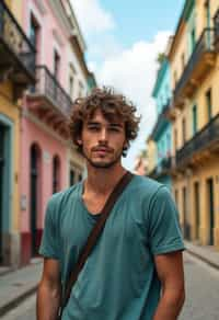 man as digital nomad in Havana with the colorful old town in the background