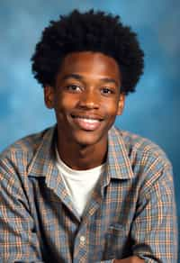 (school portrait) photo headshot of a young 18 y o man in 1990s style, nineties style, 90s, 1990s fashion, 1990s hair, school, man is sitting and posing for a (yearbook) picture, blue yearbook background, official school yearbook photo, man sitting (looking straight into camera), (school shoot), (inside), blue yearbook background