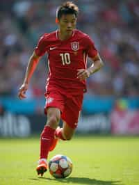 man as Football Player in the FIFA World Cup playing in a Football Match