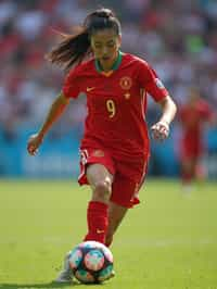 woman as Football Player in the FIFA World Cup playing in a Football Match