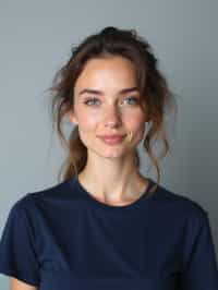 woman as official passport photo for government documents. wearing a dark blue navy t-shirt. photorealistic. light gray background. entire face visible. entire head visible