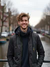 man as digital nomad in Amsterdam with the Amsterdam Canals in background