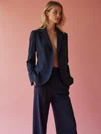 woman wearing navy colopink pants suit  in try on fashion shoot for Zara Shein H&M