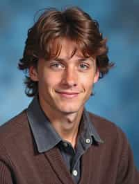 (school portrait) photo headshot of a young 18 y o man in 1990s style, nineties style, 90s, 1990s fashion, 1990s hair, school, man is sitting and posing for a (yearbook) picture, blue yearbook background, official school yearbook photo, man sitting (looking straight into camera), (school shoot), (inside), blue yearbook background